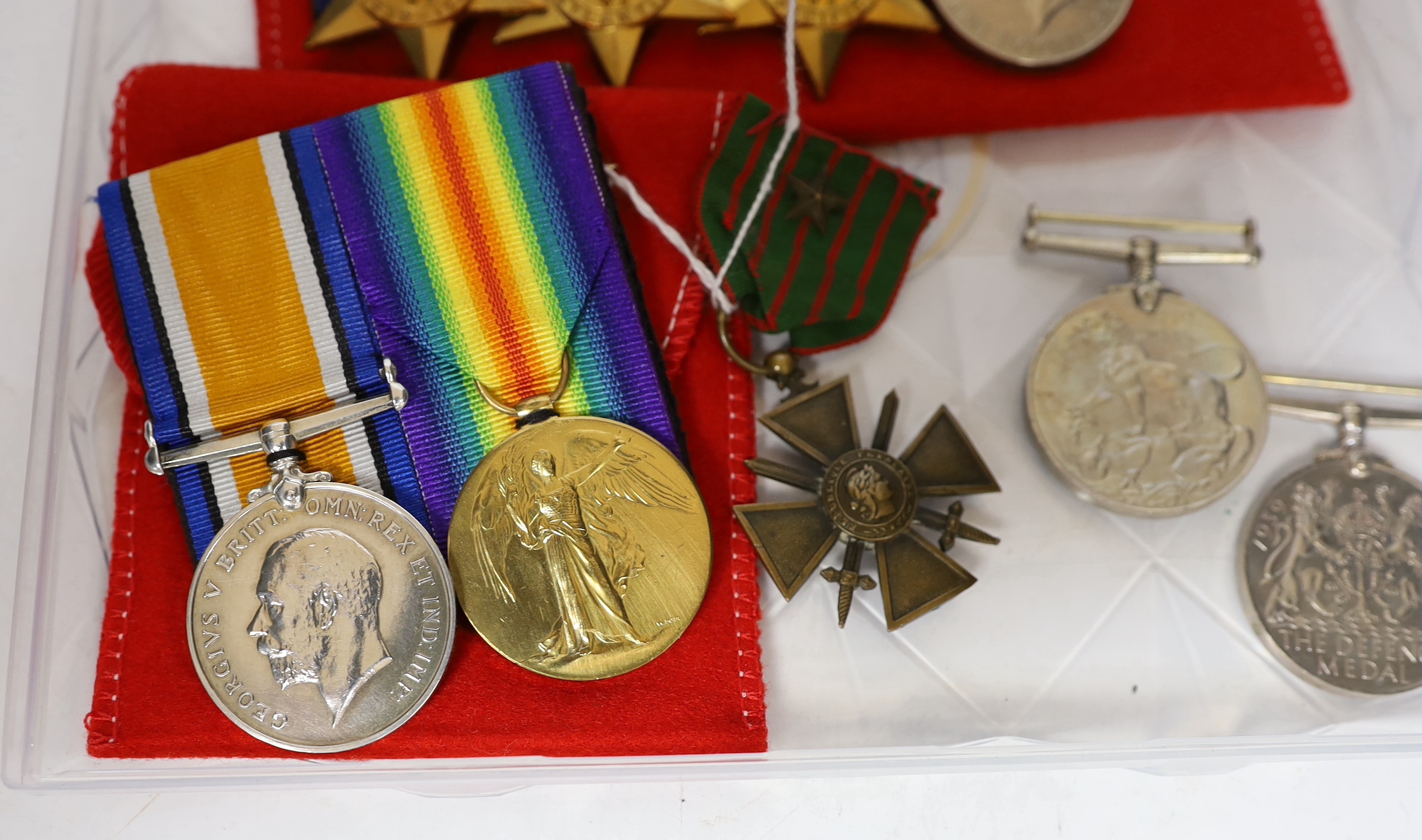 Nine WWI / WWII medals; a pair of WWI medals, the War medal and Victory medal to J.R. Hemmings R.A.F., a pair of WWII medals in O.H.M.S. card box to J.B. Robinson, with oak leaf, a group comprising; the 1939-45 Star, the